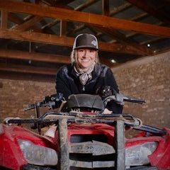 a young woman on an atv