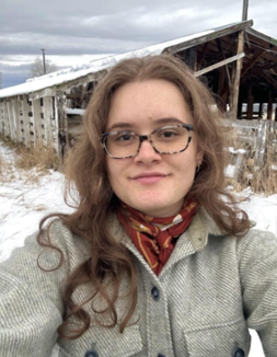 A young woman with glasses