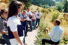 Dr. Sowell (right) discussing range management with students. Bok teaching range class to students