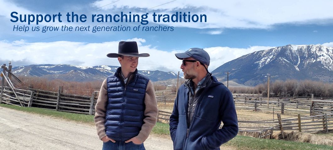 A ranching systems students talks with a rancher.